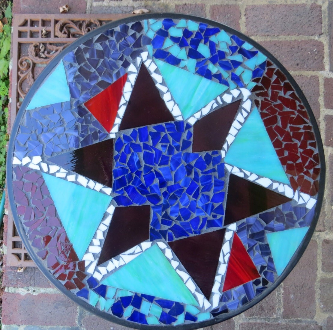 Abstract star stained glass mosaic table. Stained glass mosaic