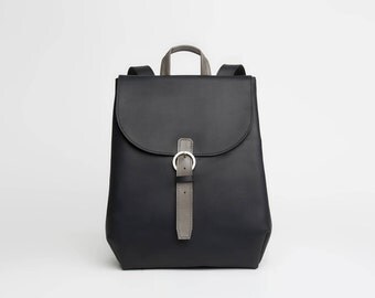 Black leather backpack with laptop compartment