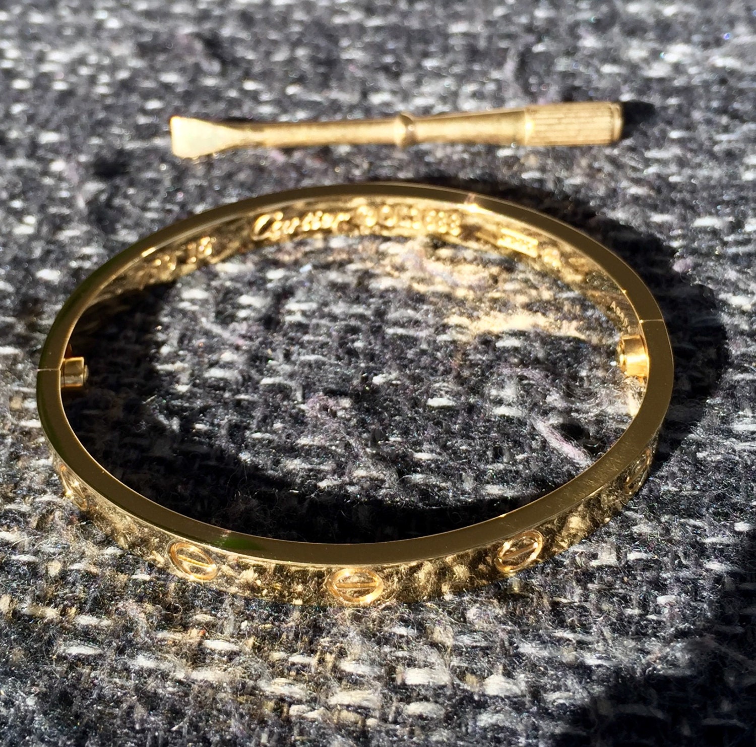 gold bangle with screws