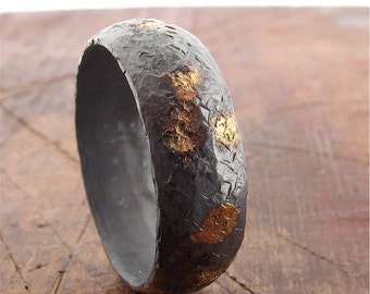 Rustic gold and black silver mens wedding band 8mm wide court band with hammered surface.