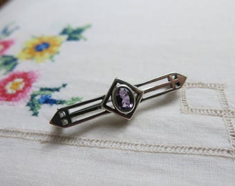 Silver and amethyst Arts and crafts style bar brooch