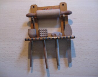 For the dollhouse miniature wooden spoon rack ... ca. 1920.