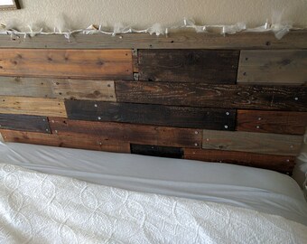 Rustic reclaimed plank wood headboard