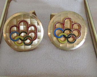 1 paire de boutons de manchettes métal doré des jeux olympiques Montréal 1976 / gold plated cufflink Montréal 1976 olympic games