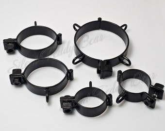 Set of 5 steel shackles (irons) for BDSM play. Custom dungeon equipment.