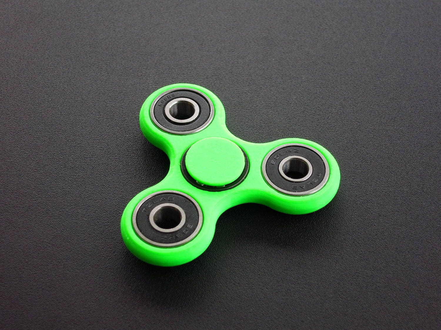Prong Neon Green Fidget Spinner Toy on Black Bearing