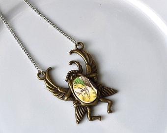 Antique brass Egyptian Scarab Broken Plate Pendant - Green and Yellow - Recycled China