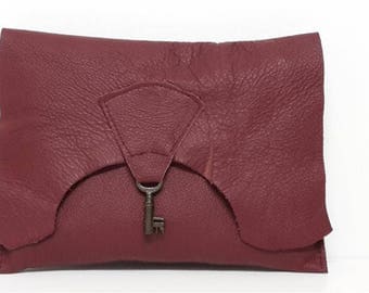 Raw edge leather clutch purse with vintage key detail - wine