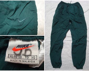 green nike windbreaker pants