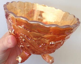 Gorgeous vintage peach iridescent lustre carnival glass bowl with four feet