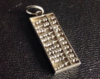 Silver abacus pendant or charm