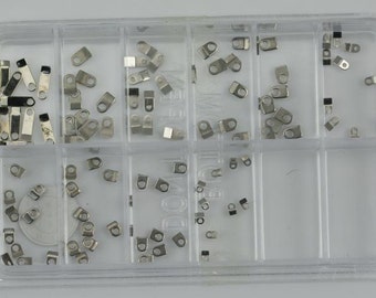 100 Watch case movement clamps parts casing repair fix assorted watchmakers