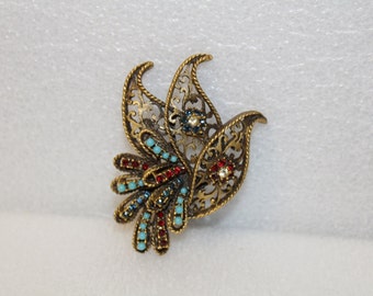Vintage BSK brooch Rhinestones and Turquoise beads.