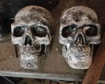 Skull knob. Concrete with paint and lacquer clear finish.