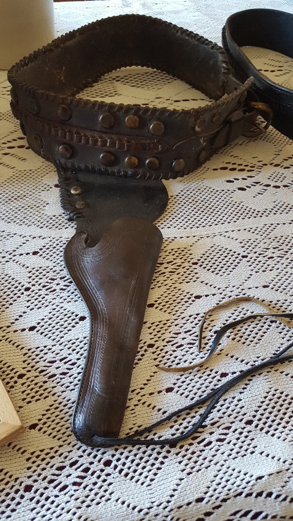 leather gun belt and holster vintage hand tooled with leg