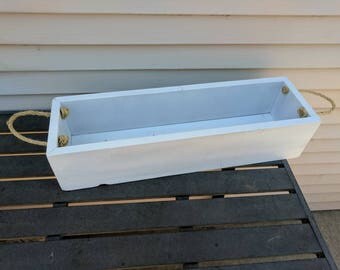 Rustic planter box for herbs made from reclaimed local wood