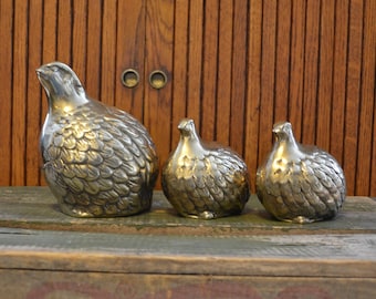 quail family figurines