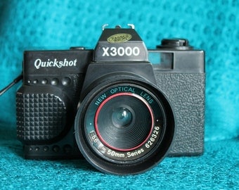 Quick shot x3000 35mm Plastic Camera
