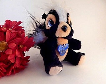 flower the skunk stuffed animal