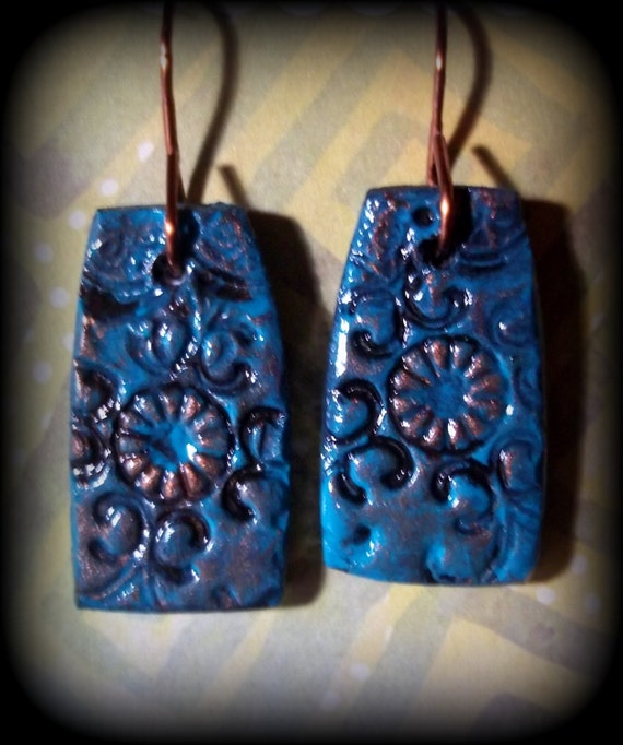 Items similar to Stamped clay hand painted earrings,copper hook