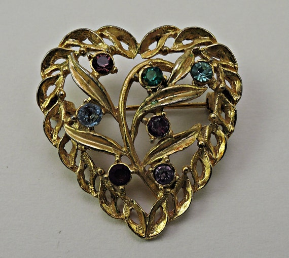 Items similar to Gold Tone Heart Pin with Multi Coloured Rhinestones 195060s on Etsy