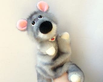Mouse. Toy glove. Bibabo. Hand puppet. Marionette. Toy on hand. Puppet theatre.