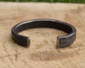 Stainless oxide chisel cut cuff bracelet