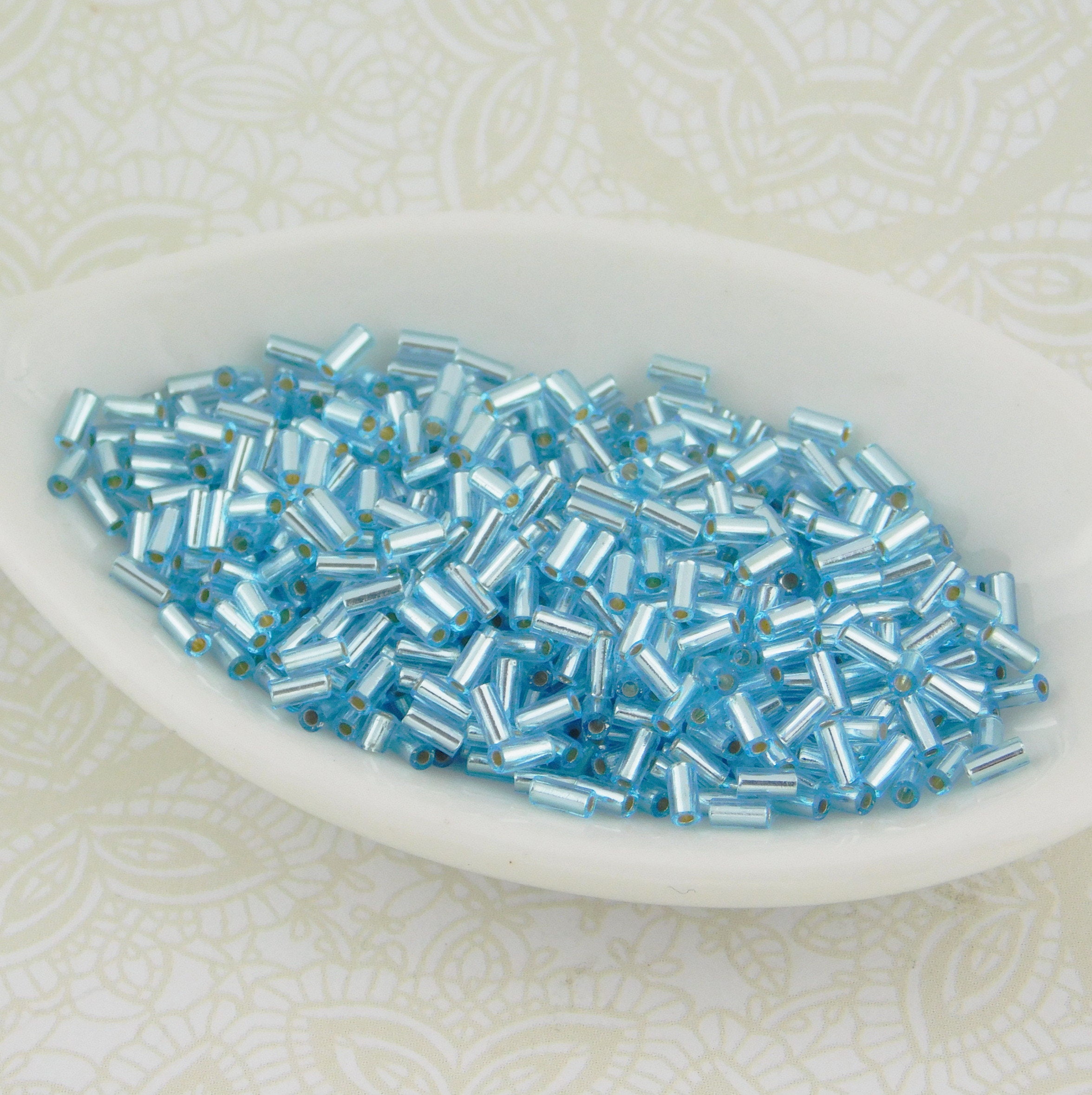 3mm Bugle Beads Miyuki 18 Silverlined Aqua Blue 9 Grams Glass Bugles From Peacockbeadshop On