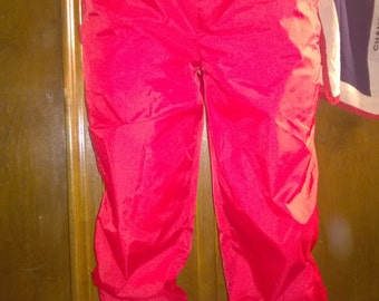 red windbreaker pants