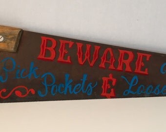 Beware Pick Pockets Loose Women – Funny Rustic Aluminum Sign 8x12 Inches