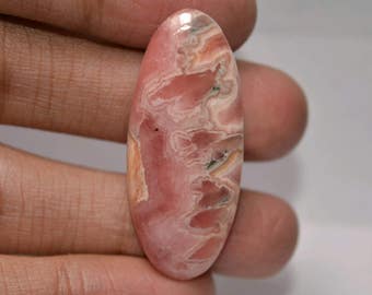 Rhodochrosite Cabochon Oval..42.35x17.95x5.85mm..52.5cts...A#1583