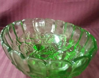 12 inch green footed embossed fruit bowl. Indiana glass