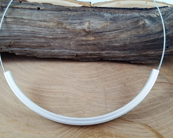 Necklace with metal tube