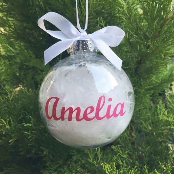 Baby's First Christmas Decoration. Bauble filled with