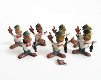 the three caballeros figurines
