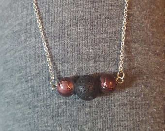 Beautiful lava diffuser necklace with purple accents