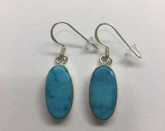 Sterling silver earrings with blue turquoise