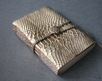 Golden python sketchbook / flashy journal with a braided cord. Fountain pen friendly!