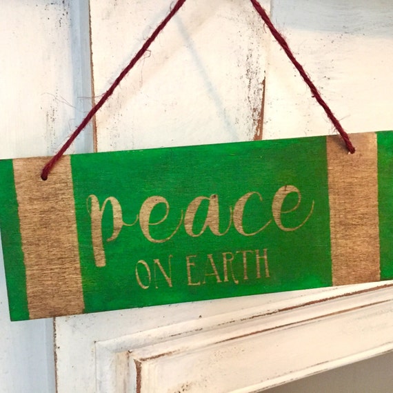 Small wooden sign peace on earth