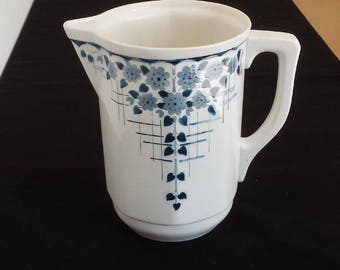 St. Ghislain, Belgium, 1830: large airbrushed 'spritzdekor' water pitcher with blue-grey flowers