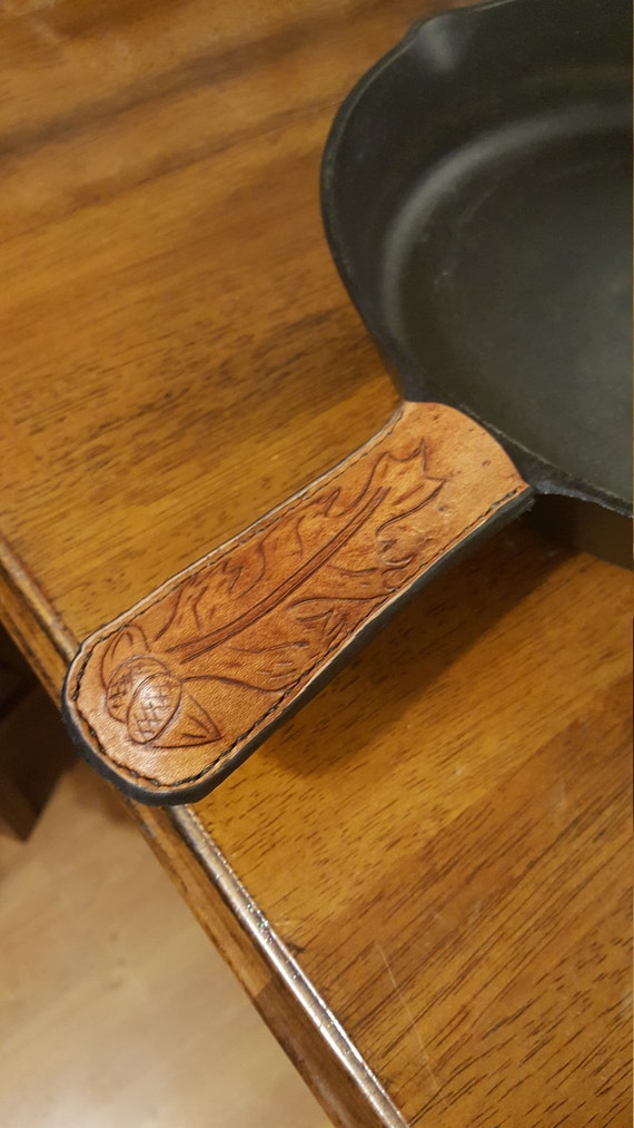 Leather handle cover for cast iron skillets
