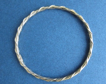 Christian Dior, bracelet ring twisted, end of the 1970s.