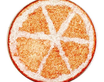 Fruity Orange - Fruit Highlighter shaped as an orange slice. Gold & Pink highlighter blush