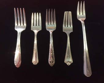 Set of 5 old silver plate baby forks