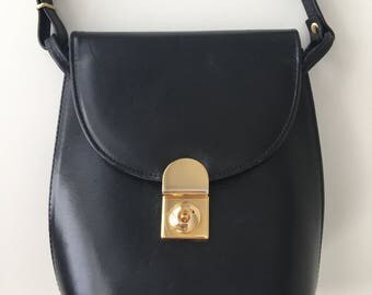 Vintage black shoulder or crossbody leather bag