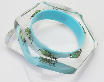 Gorgeous blue lucite bracelet with real glowing insects