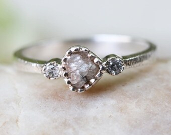 Tiny rough diamond ring in texture sterling silver band and twin side set diamond gemstones