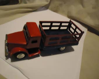 Vintage Made In Japan Friction Metal or Tin Red Livestock Truck, collectable