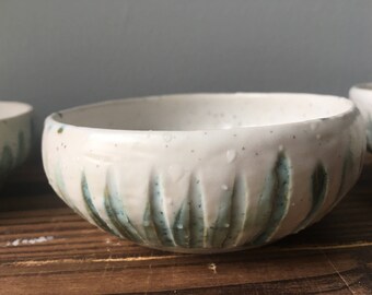 Speckled white and green ice cream bowls