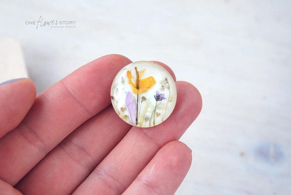 Botanical brooch with yellow celandine flowers. Real herbs on